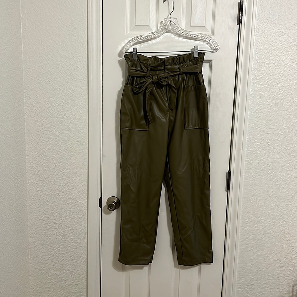 NWT.Olive colored pleather pants. Ties in the front.